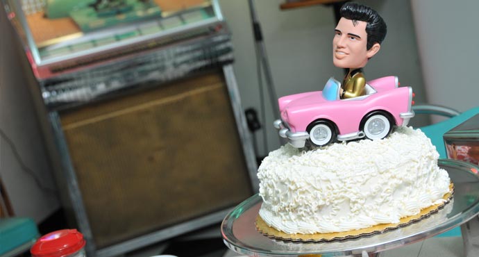 8 Wedding Cake with a Elvis Pink Caddy Cake Topper for the Bride and Groom 